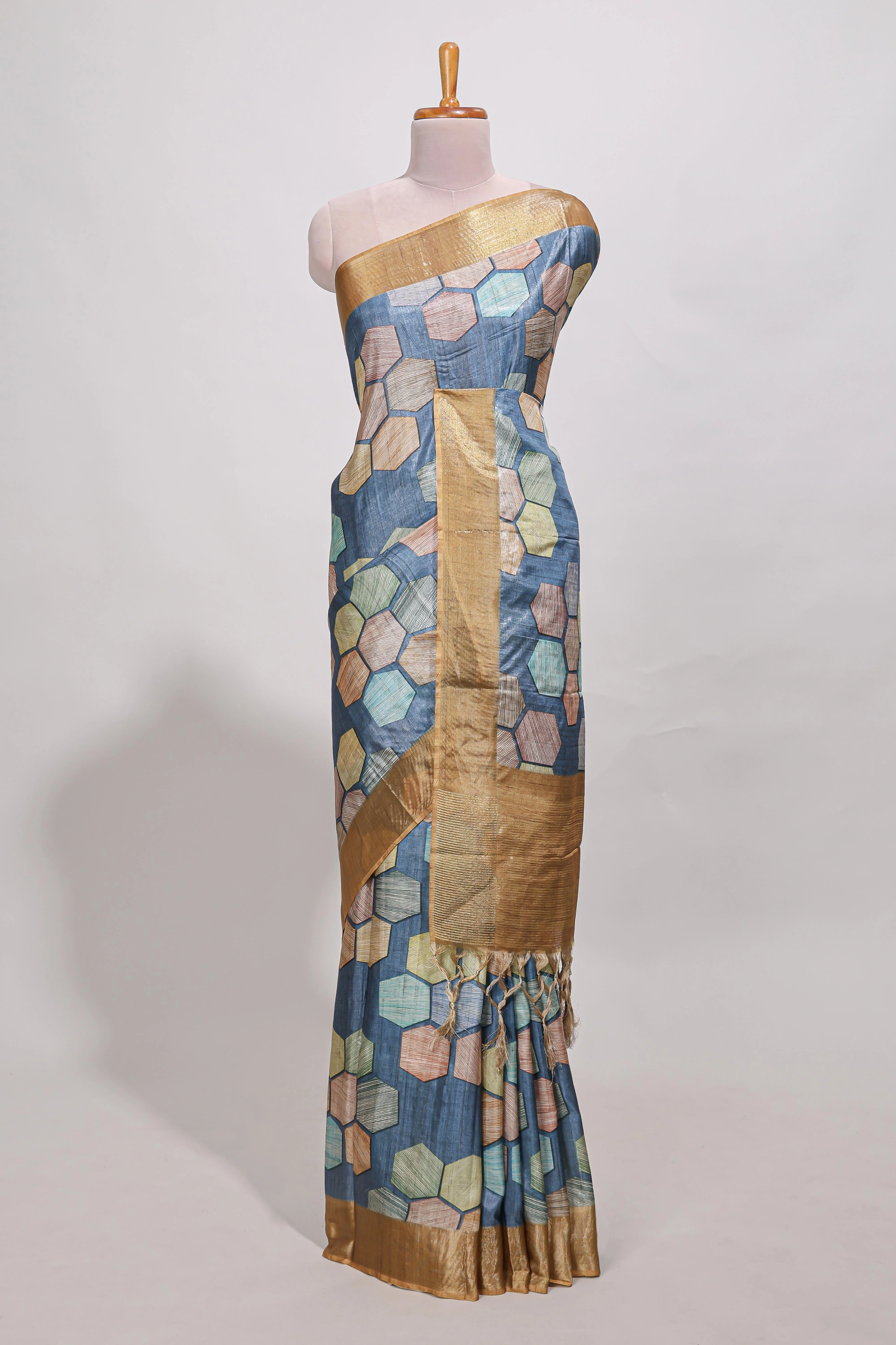 Blue geometrical tussar silk saree multi coloured honeycomb geomatric patterns , rich matching pallu along with tassles