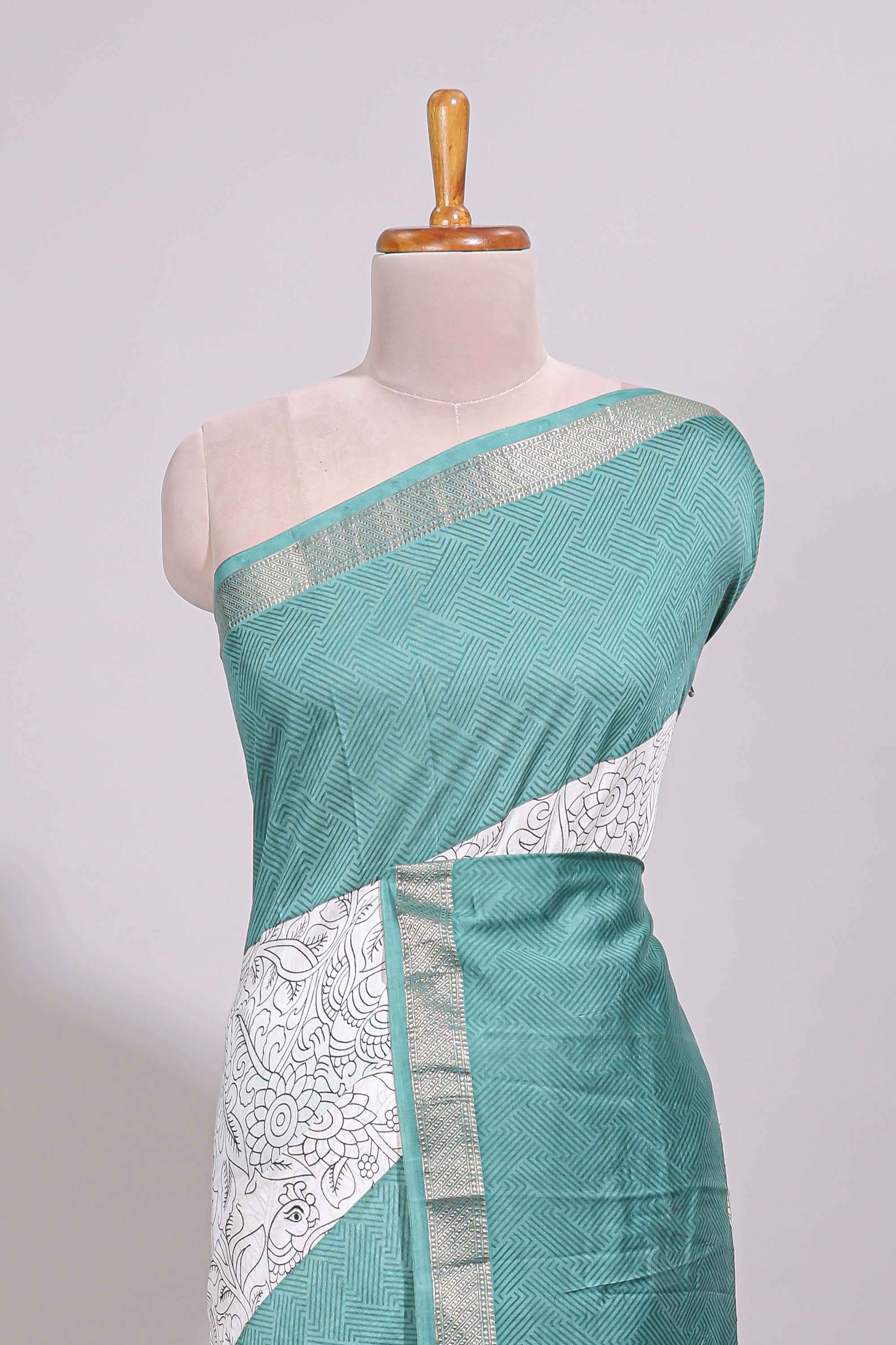White floral design Chanderi cotton saree with contrast turquoise green zari border and floral print blouse - Image 3