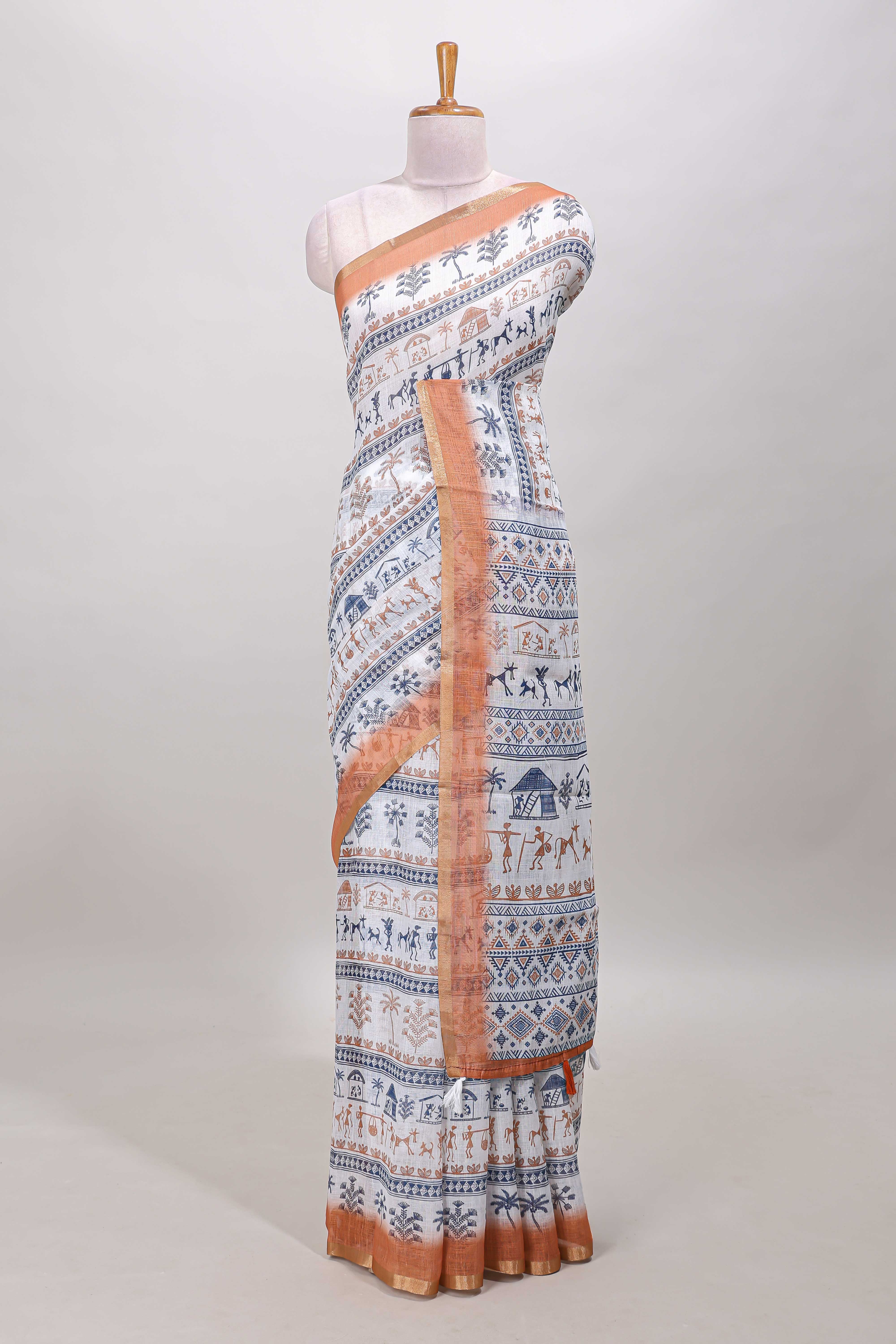 White warli print linen cotton saree with contrast zari border and printed blouse - Image 2